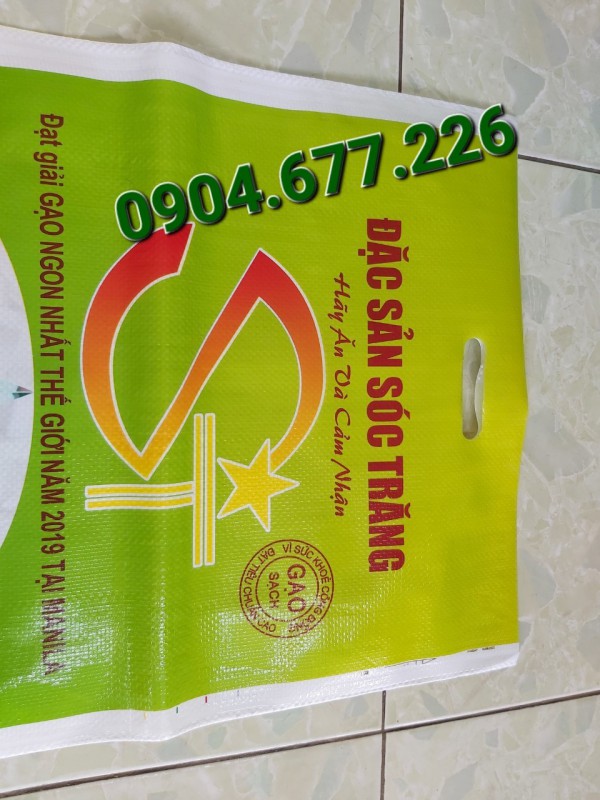 Bao pp dệt, bao đựng gạo ST25 bao đục, màu xanh có đục quai xách
