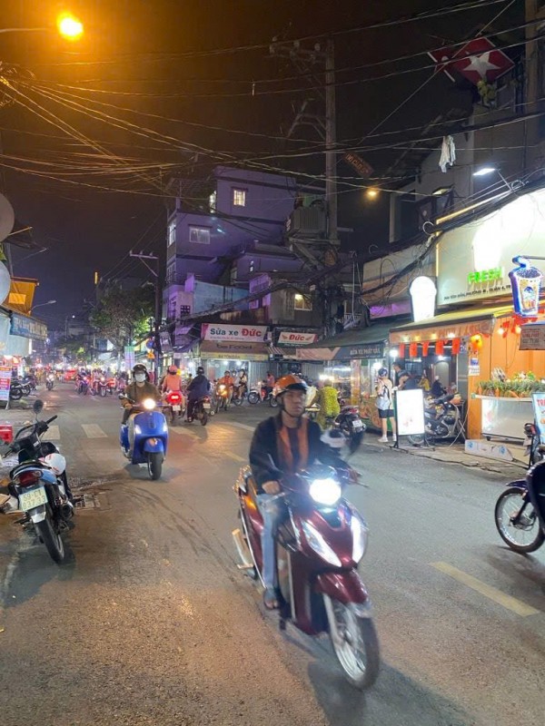Nhà mặt tiền Tôn đản quận 4,cách chợ cầu cống vài bước chân giá mềm 5 tỷ 8
