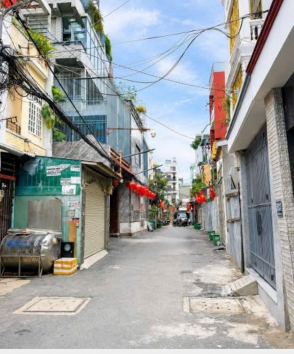 Bán Nhà Quận 7_ngay Nhà thi đấu Đa Năng - 90m2,3Tầng 3PN, Xe Hơi Ngủ Trong Nhà, chỉ 9.X tỷ