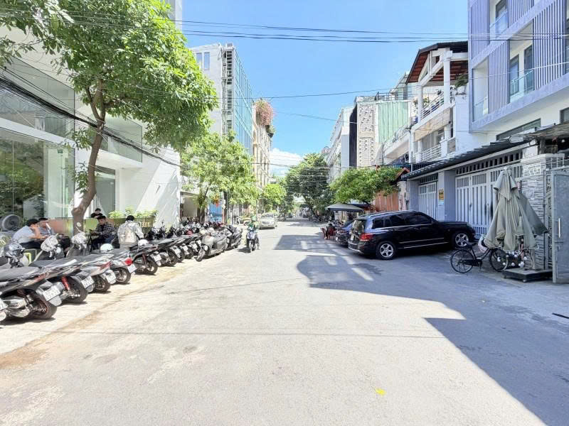 Bán Nhà 7 Tâng  - Mặt tiền Hẻm 12m Nguyễn Gia Trí, 12x20m, Dòng tiền 300 triệu, 89,9 Tỷ.